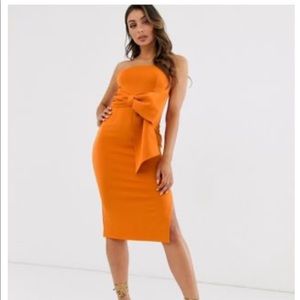 Orange midi wedding guest dress w/ large bow/slit
